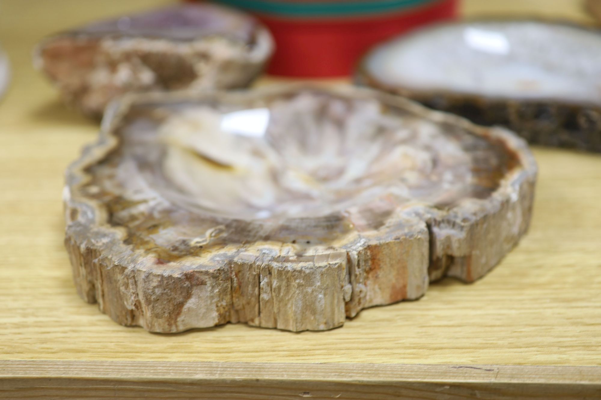 An amethyst geode section and assorted mineral specimens